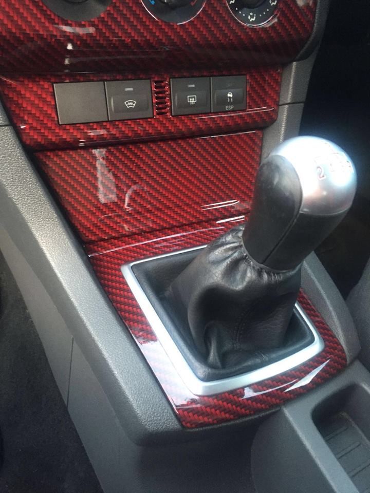 Red carbon fiber shift console wrap